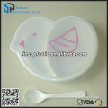 Plastic kids lunch box with spoon in chicken shape